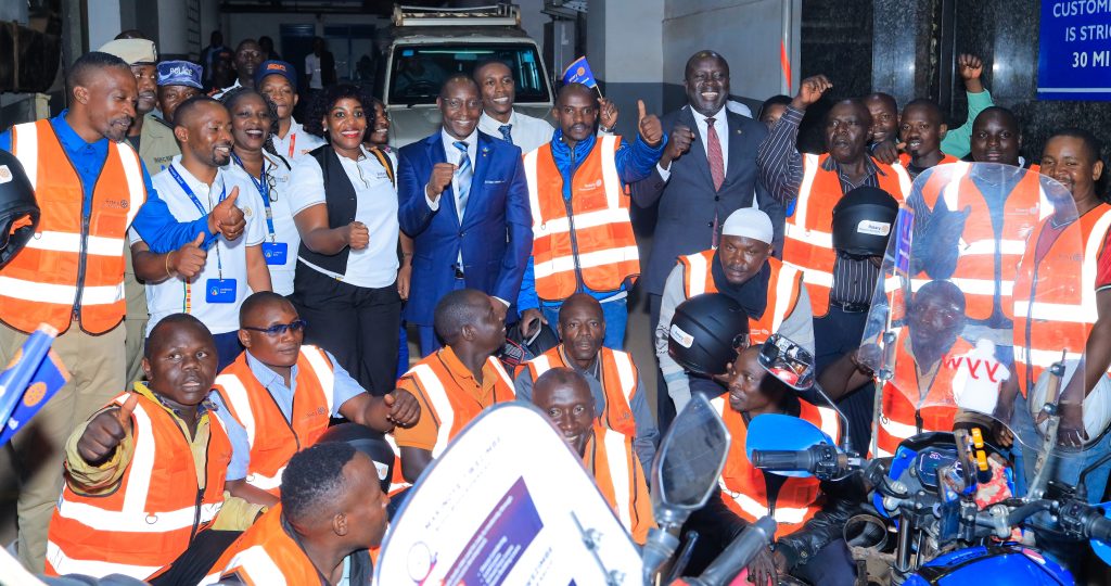 Centenary Bank Executive Director, Business Michael Opira (centre) at the launch of the road safety campaign by the Rotary Club of Mapeera
