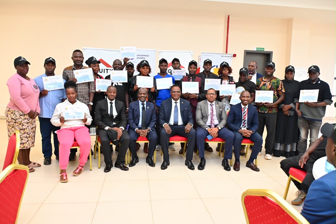 Ambassador Dickson Ogwang-Okul with the Returnees at the climax of the Conference