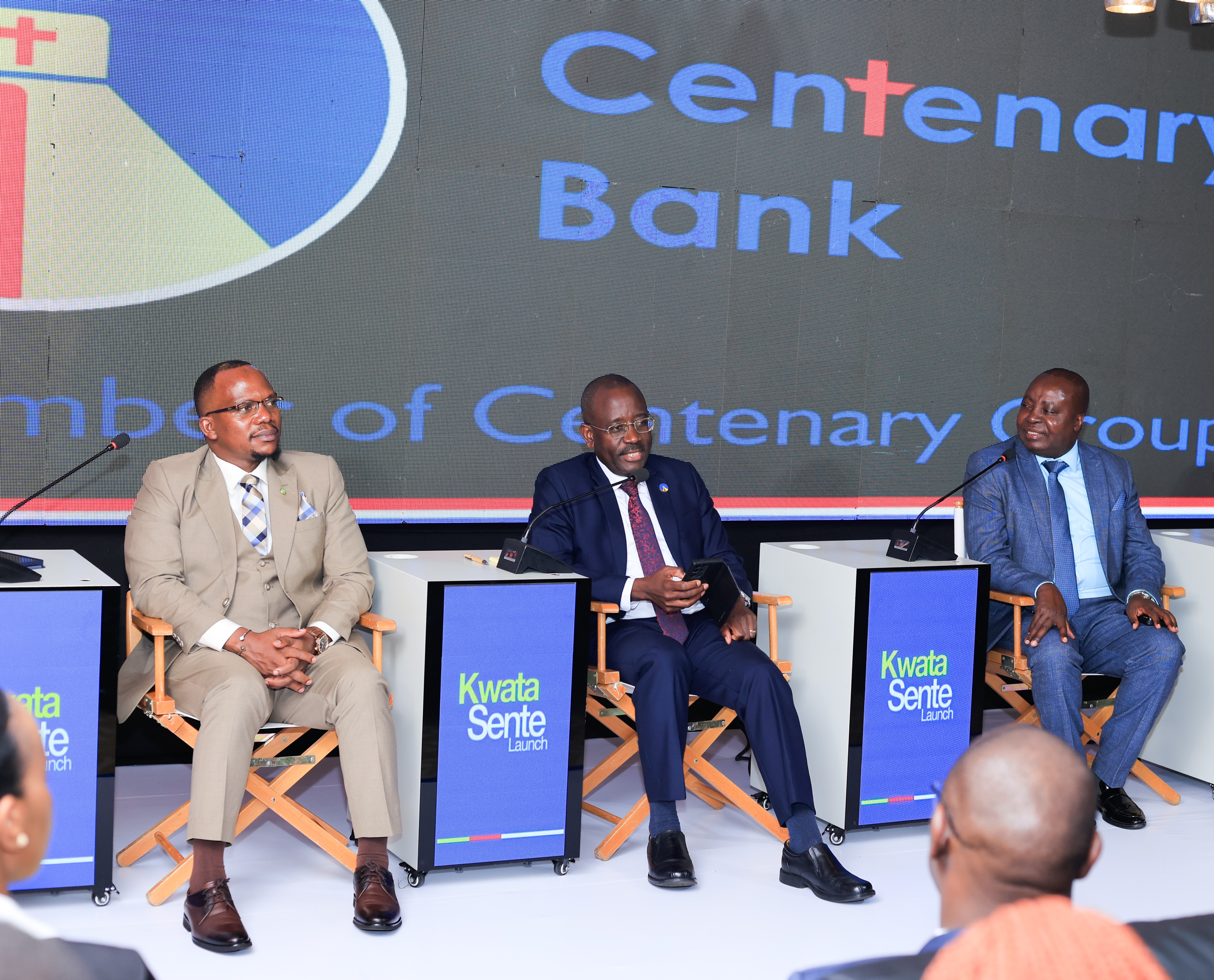 (L-R) gnuGrid CEO David Obwangamoi, Centenary Bank MD Godfrey Byekwaso and Airtel Money MD Japhet Aritho