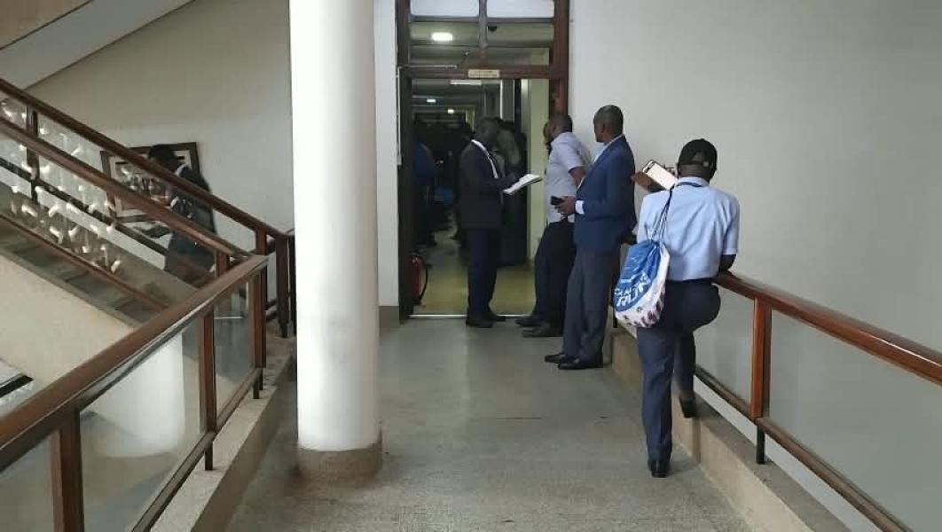 Parliamentary staff at Level 4 where validation is taking place