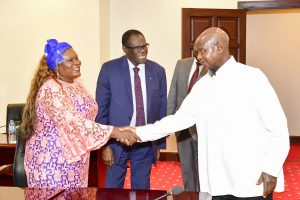 President Museveni shares a light moment with UN Resident Coordinator in Uganda Rosa Malango as UN Secretary General's special envoy for Burundi Micheal Kafando (C) looks on during a meeting at Entebbe on F